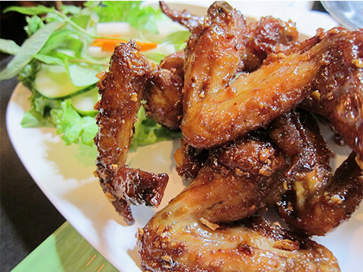 Ike's Vietnamese Fish Sauce Wings ($14): half dozen chicken wings marinated in fish sauce and sugar, then deep fried, tossed in caramelized Phu Quoc fish sauce and garlic.